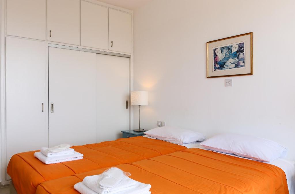 Postel nebo postele na pokoji v ubytování Axiothea Hotel