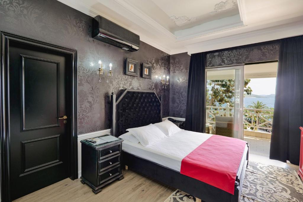 Postel nebo postele na pokoji v ubytování Porto Eda Hotel