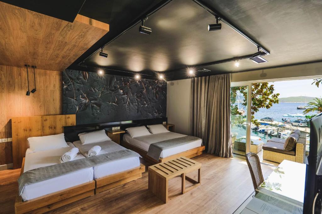 Postel nebo postele na pokoji v ubytování Porto Eda Hotel