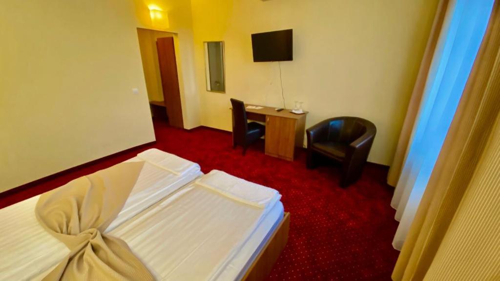 Postel nebo postele na pokoji v ubytování Hotel Termal