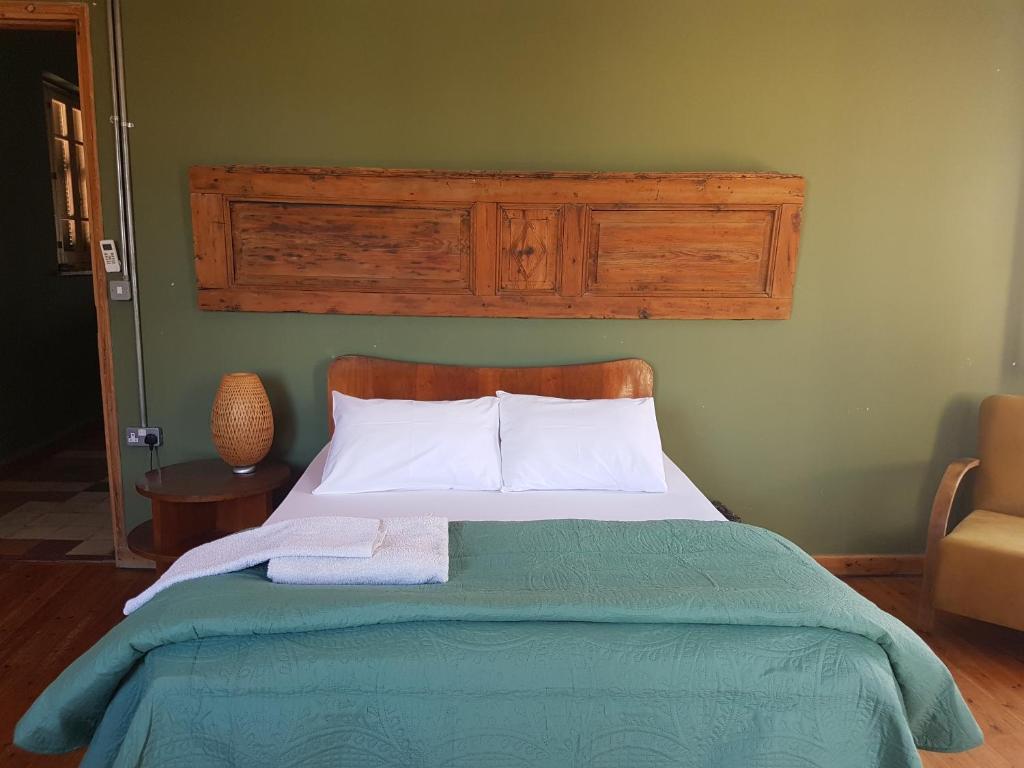 Postel nebo postele na pokoji v ubytování Ines Guest House