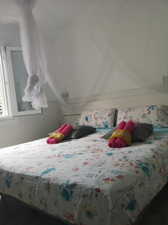 Posteľ alebo postele v izbe v ubytovaní Yumbo room
