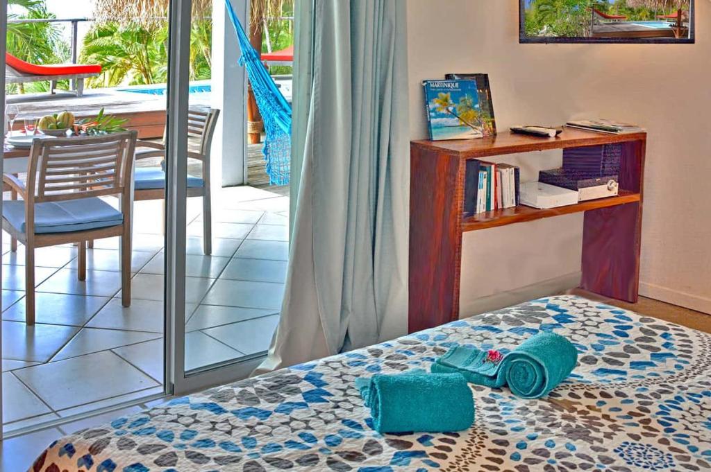 Voodi või voodid majutusasutuse Vue Turquoise Parasol toas