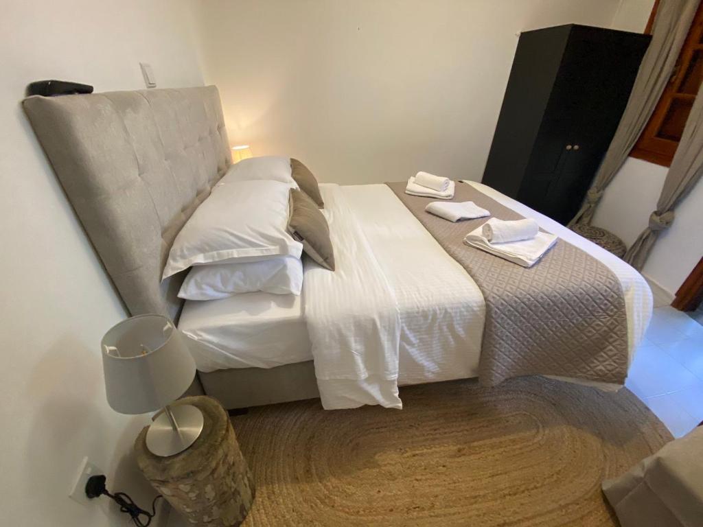 Postel nebo postele na pokoji v ubytování GaliniCafe22-suites