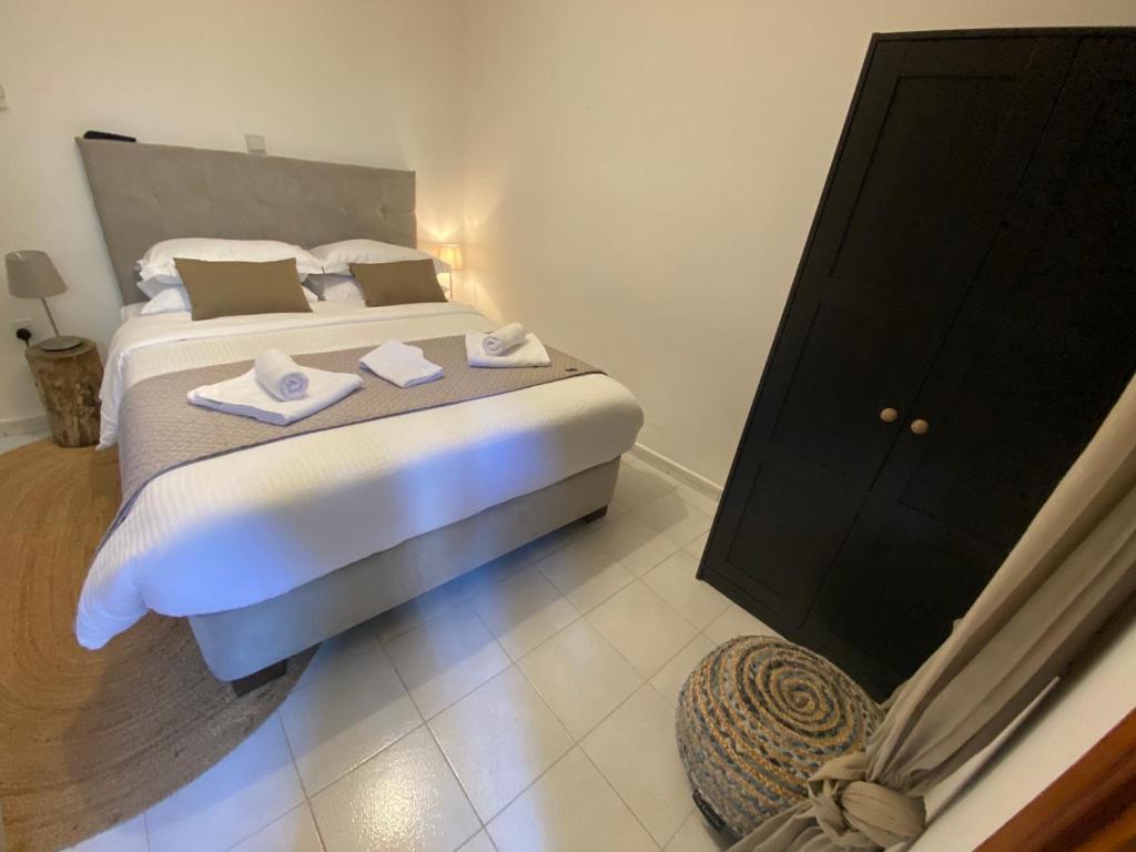 Postel nebo postele na pokoji v ubytování GaliniCafe22-suites