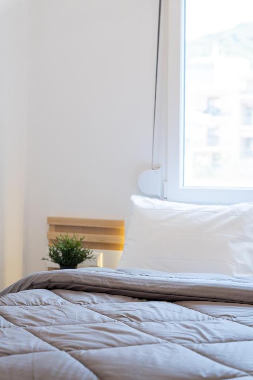 Posteľ alebo postele v izbe v ubytovaní Hermes Design Suites