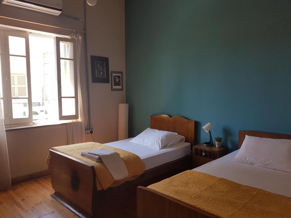 Postel nebo postele na pokoji v ubytování Ines Guest House