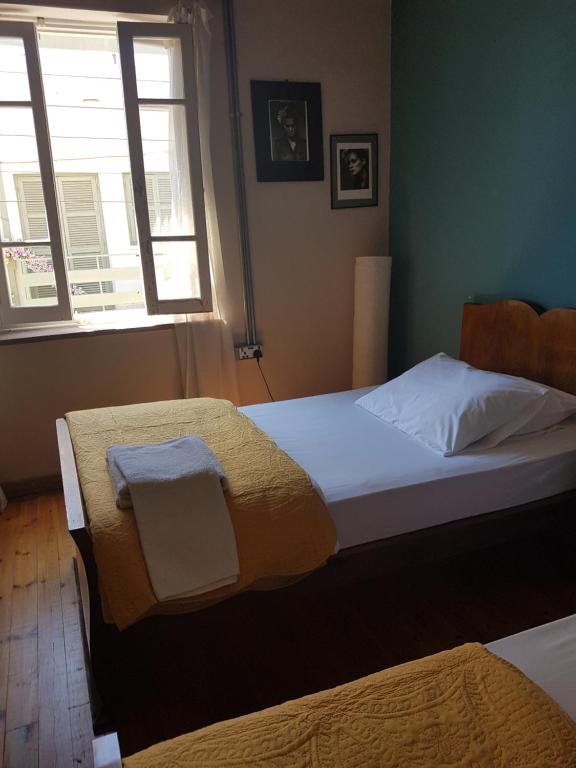 Postel nebo postele na pokoji v ubytování Ines Guest House