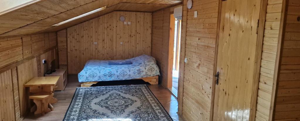 Postel nebo postele na pokoji v ubytování Kolyba Complex