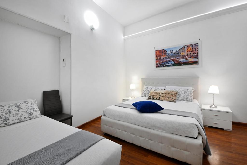 A bed or beds in a room at Notti A Roma