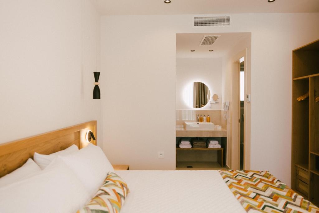 Voodi või voodid majutusasutuse Eterrano Seaside Retreat toas