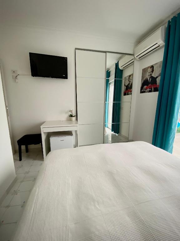 Postel nebo postele na pokoji v ubytování Capri Melody