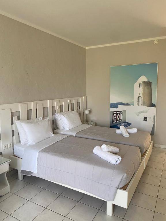Postel nebo postele na pokoji v ubytování Irina Beach Hotel