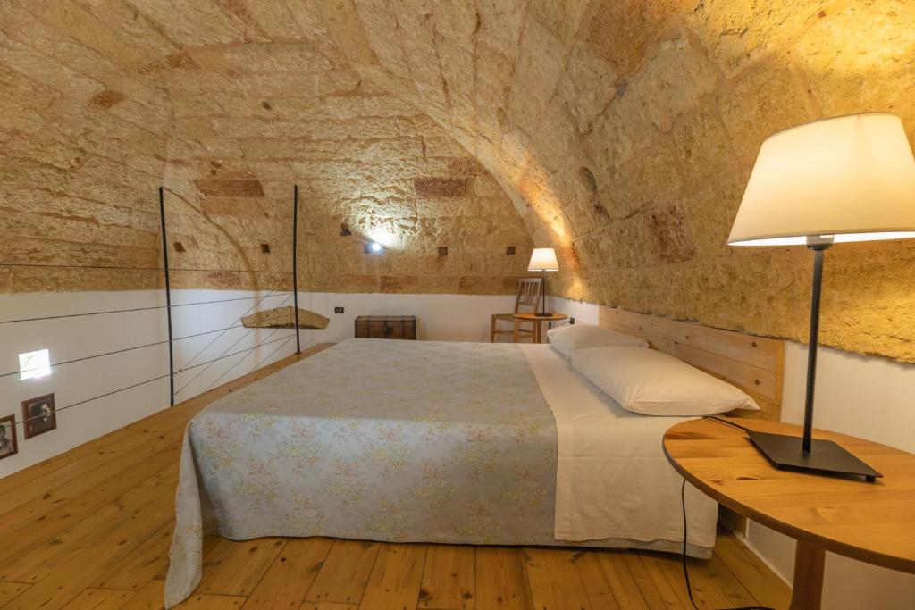 Een bed of bedden in een kamer bij B&B Casa Probo