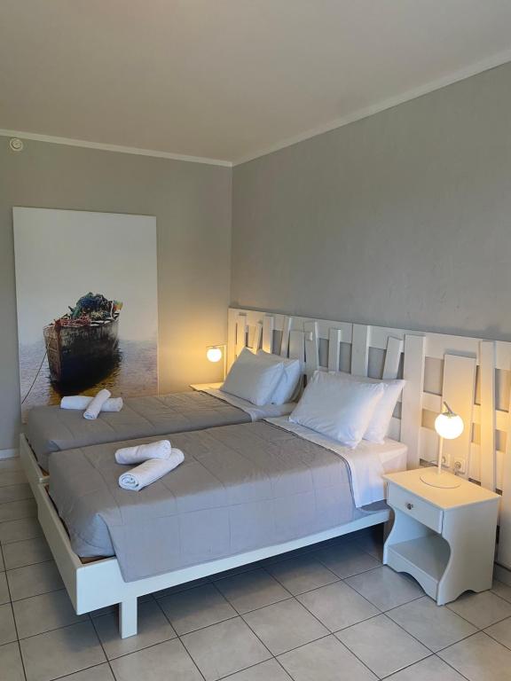 Postel nebo postele na pokoji v ubytování Irina Beach Hotel