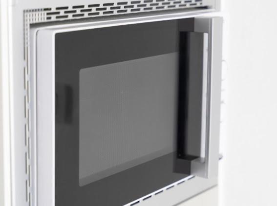 a microwave oven is attached to a wall at Casa El Terrero in Gáldar