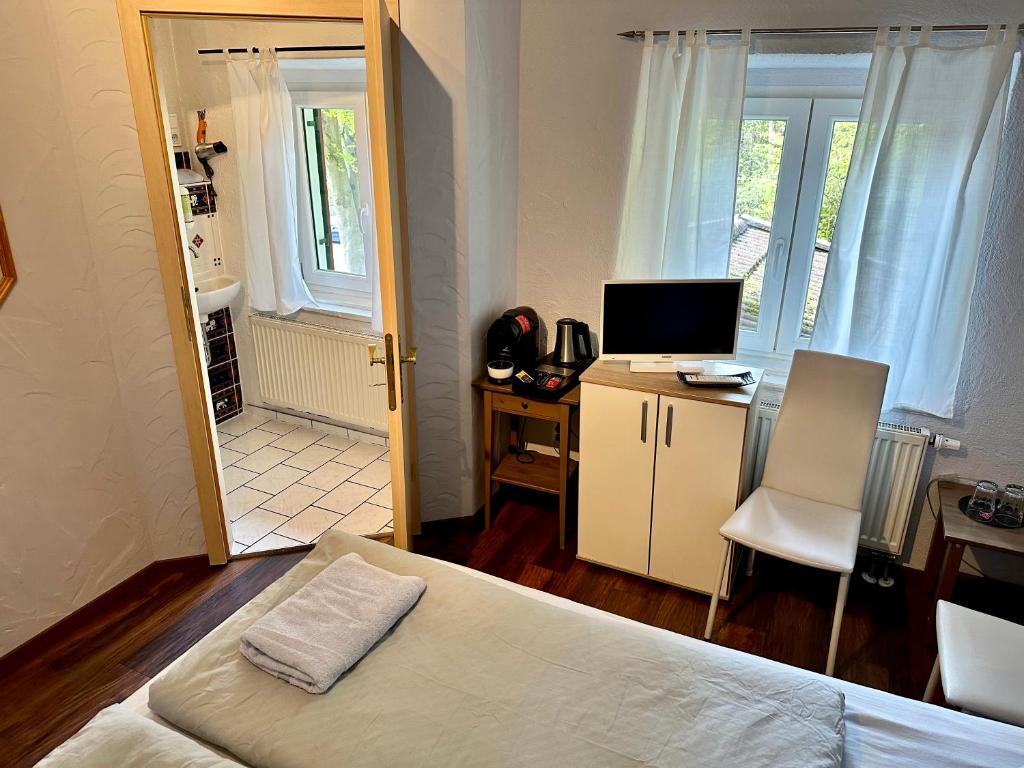 TV a/nebo společenská místnost v ubytování Pension Steakhaus Füssen