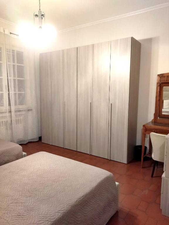 Posteľ alebo postele v izbe v ubytovaní VILLA MOLINELLA