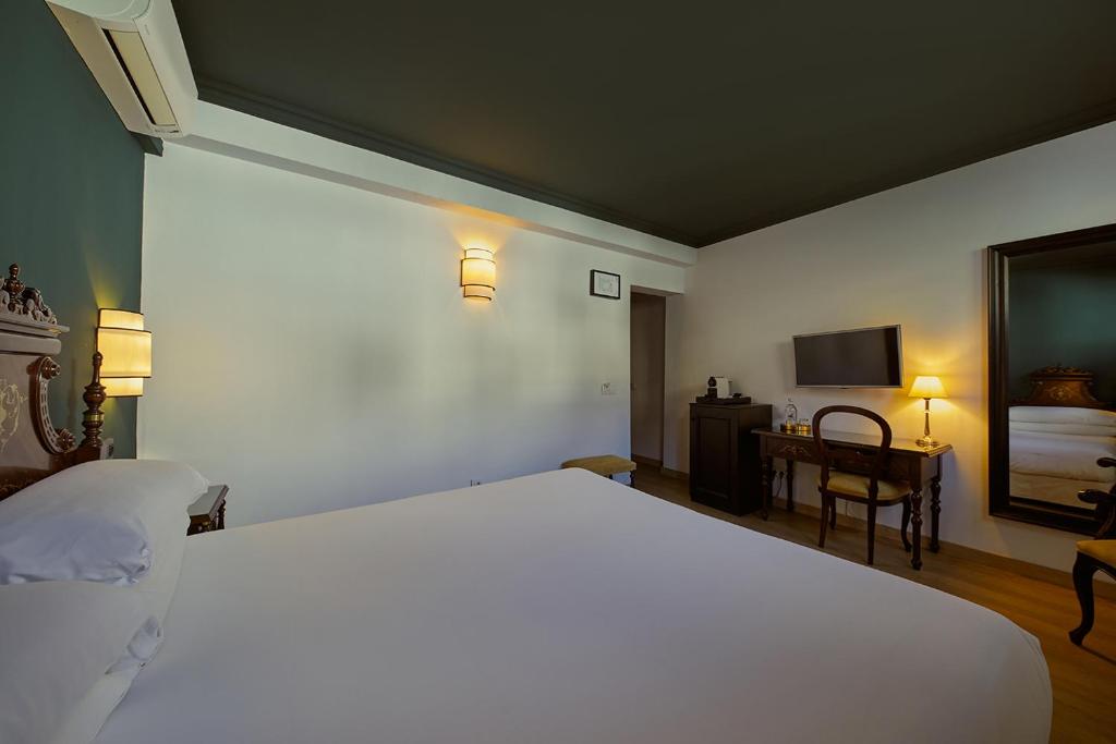 Postel nebo postele na pokoji v ubytování Hotel Born