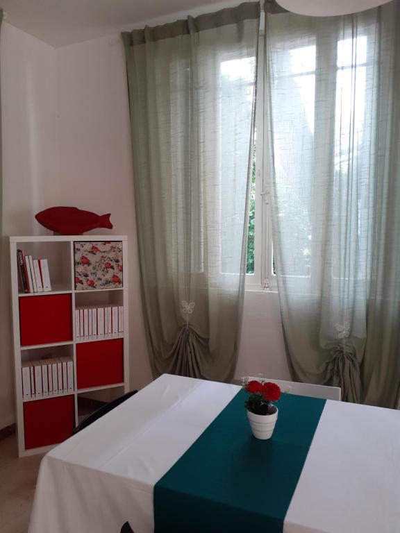 Postel nebo postele na pokoji v ubytování Hotel Migani