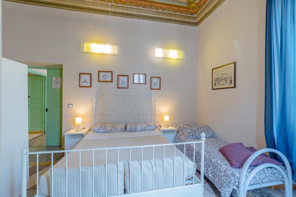 A bed or beds in a room at B&B Bernini