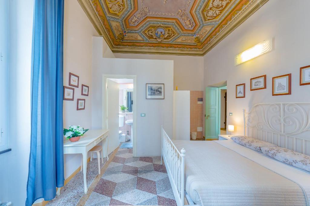 A bed or beds in a room at B&B Bernini