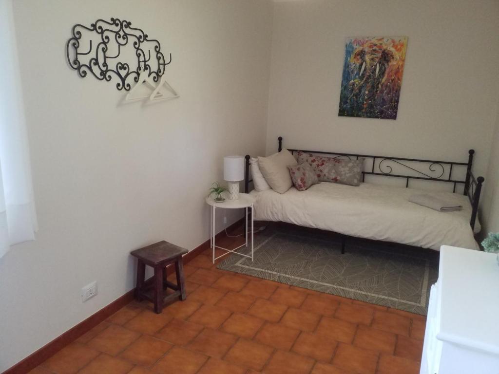 Postel nebo postele na pokoji v ubytování Casa Langhe di Mango - Barolo