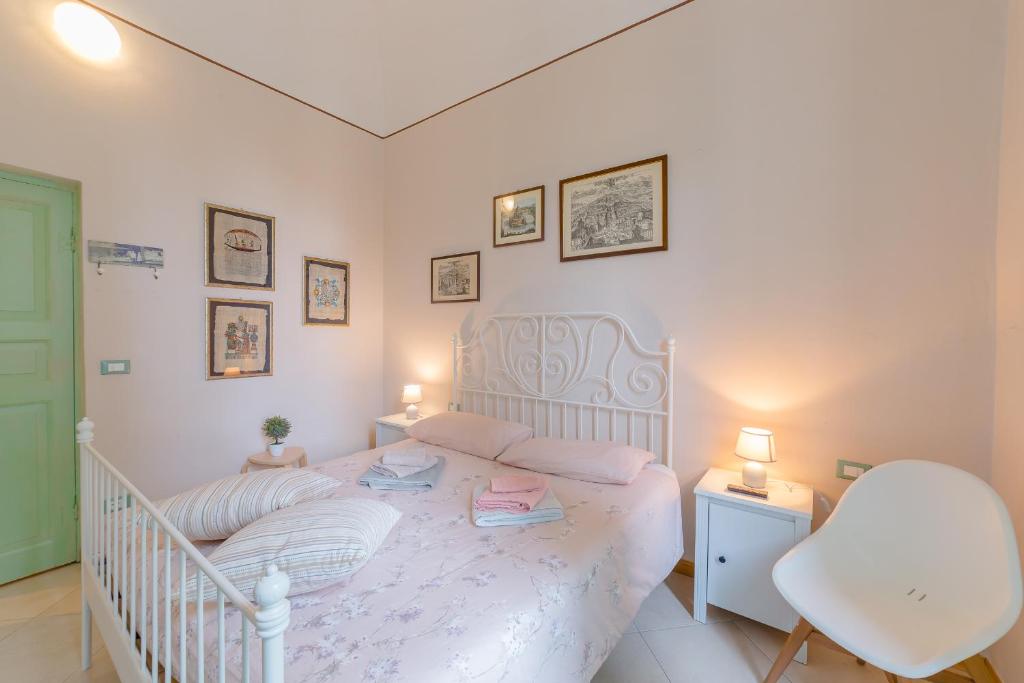 A bed or beds in a room at B&B Bernini