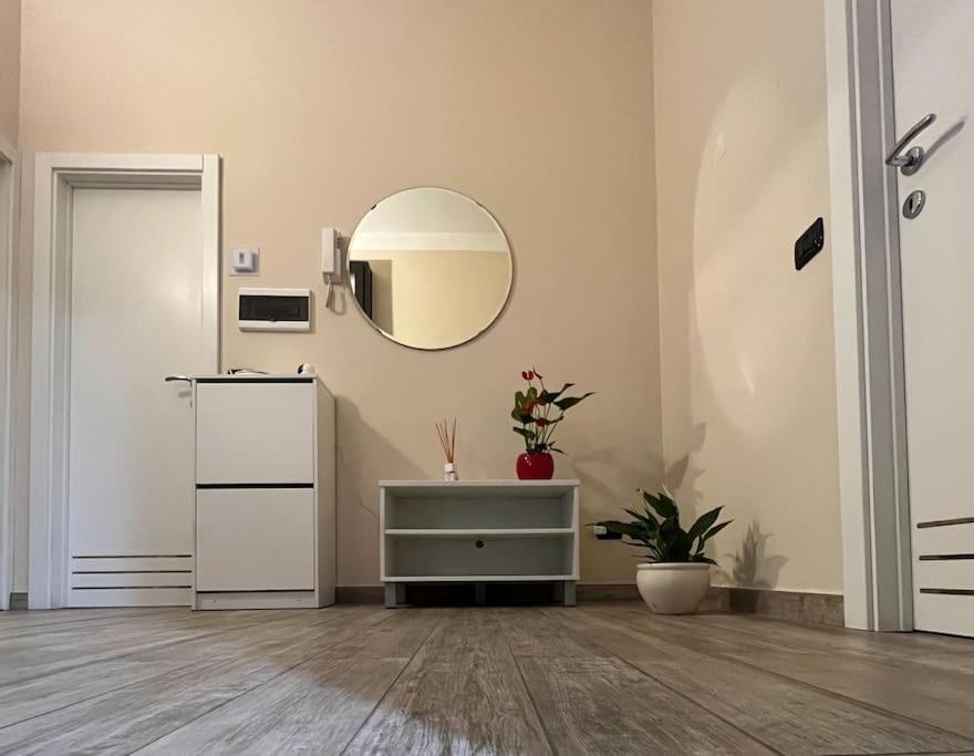 a bathroom with a sink and a mirror on the wall at Casa di Carmignanello in Cantagallo