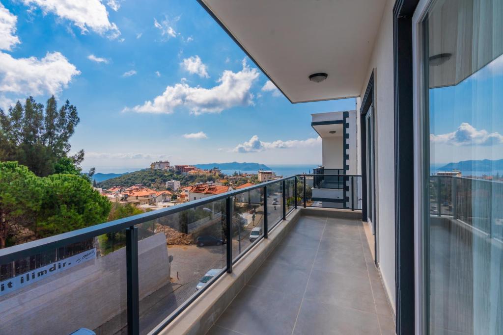 a balcony with a view of the ocean at TAYLA SUİT in Kas
