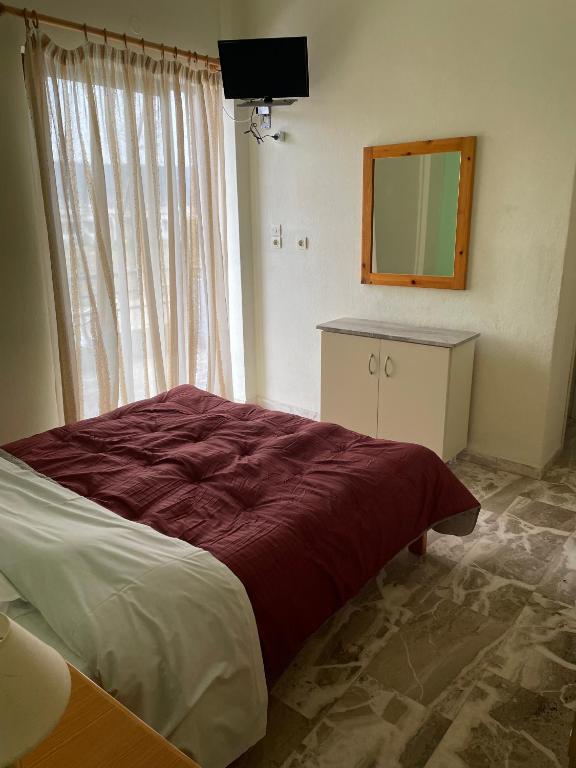 Postel nebo postele na pokoji v ubytování Finikas