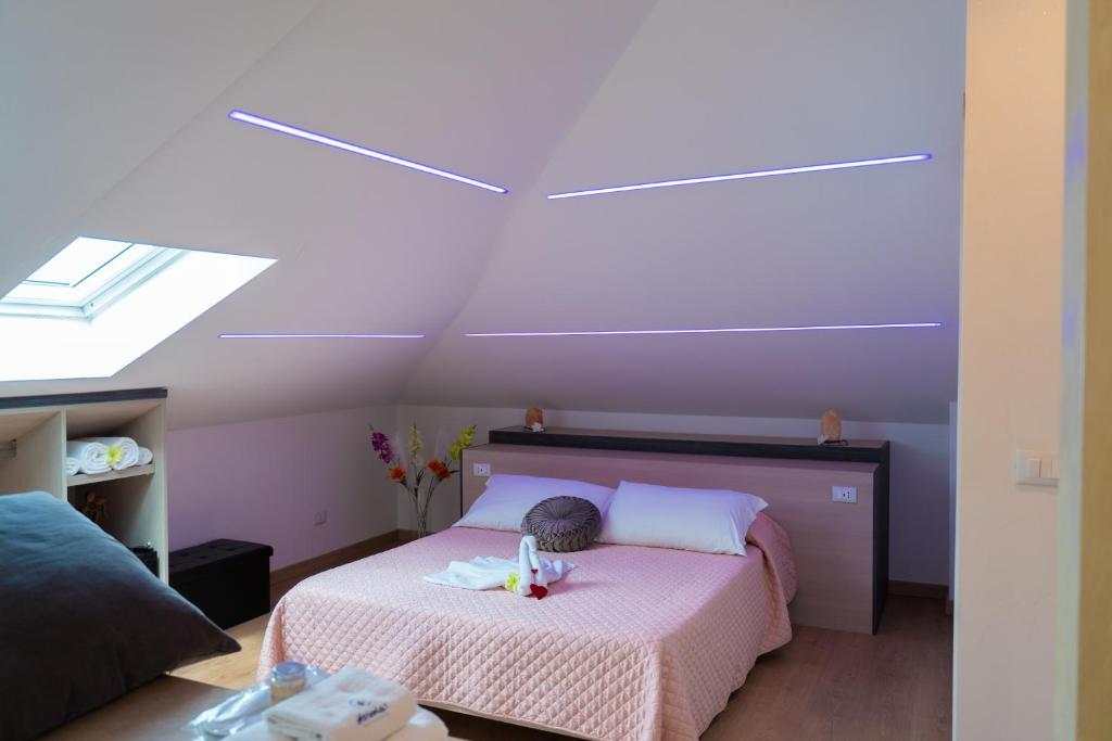 Postel nebo postele na pokoji v ubytování Asterias Residence - Rooms & SPA