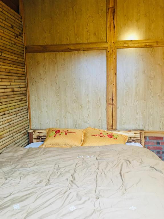 Postel nebo postele na pokoji v ubytování Sapa Guide Homestay & Trekking