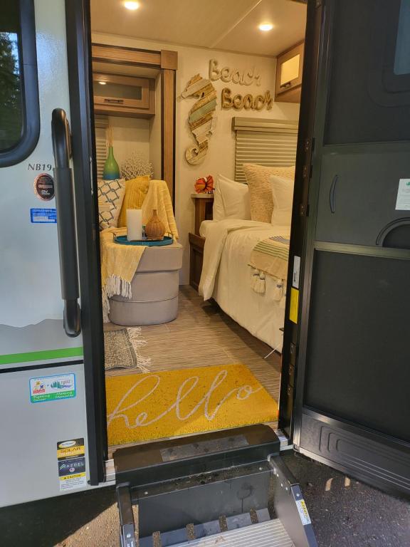 a view of a bedroom from inside an rv at Island Breeze RV in Covington