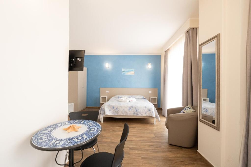 Postel nebo postele na pokoji v ubytování Asterias Residence - Rooms & SPA