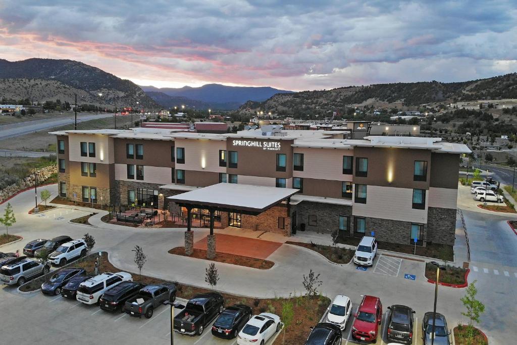 an aerial view of a hotel with a parking lot at SpringHill Suites Durango in Durango