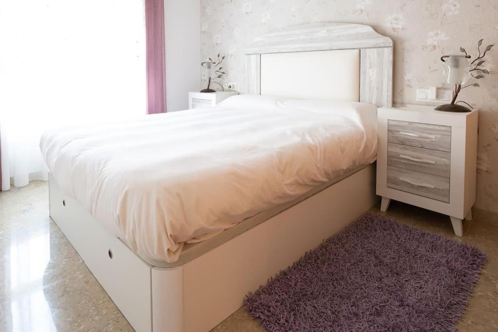 Ένα ή περισσότερα κρεβάτια σε δωμάτιο στο Apartamento playa Castellón