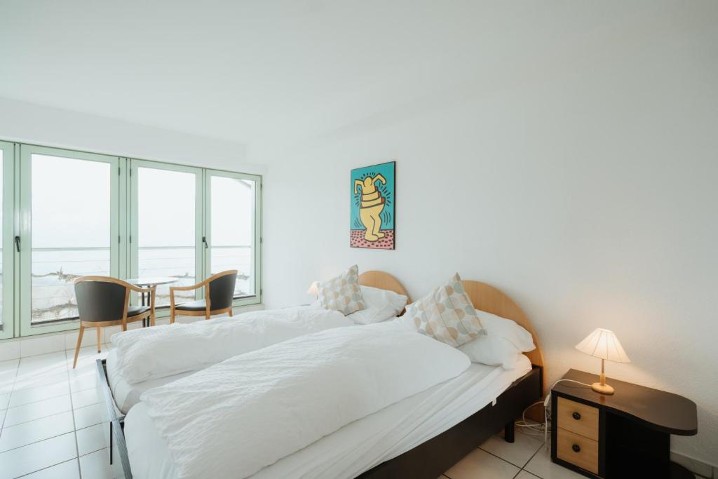 Letto o letti in una camera di Hotel Sonne