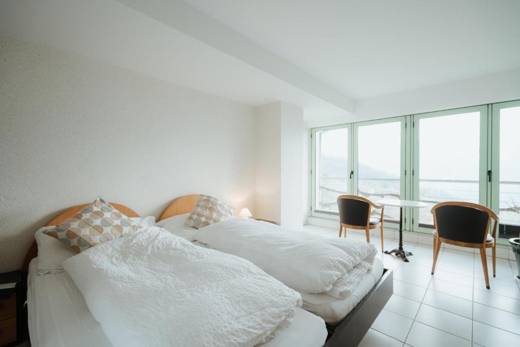 Letto o letti in una camera di Hotel Sonne