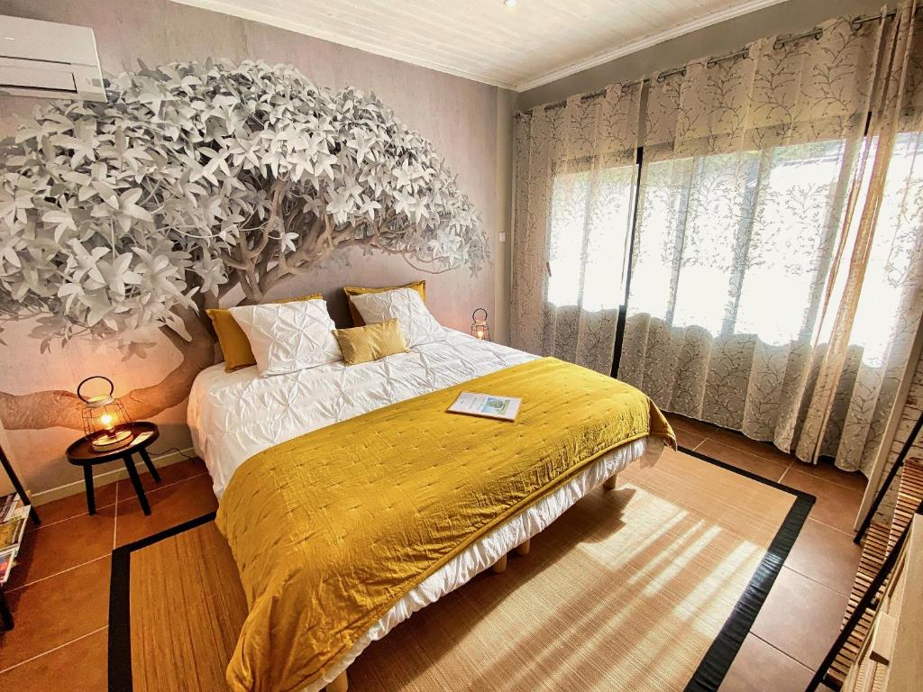 Postel nebo postele na pokoji v ubytování Douce Quiétude "L'ESCAPADE" chambre d'hôtes