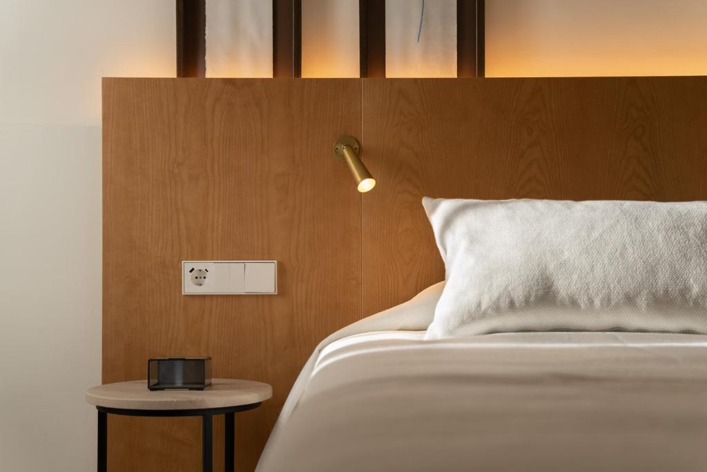 Postel nebo postele na pokoji v ubytování Nema Boutique Hotel & Spa