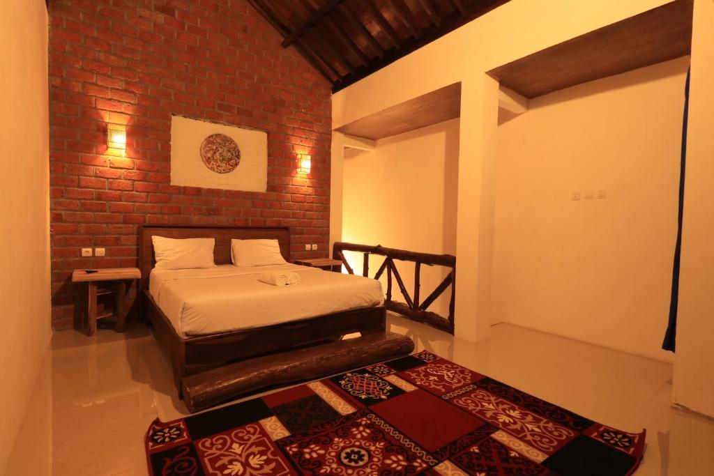 Postel nebo postele na pokoji v ubytování Mu Homestay