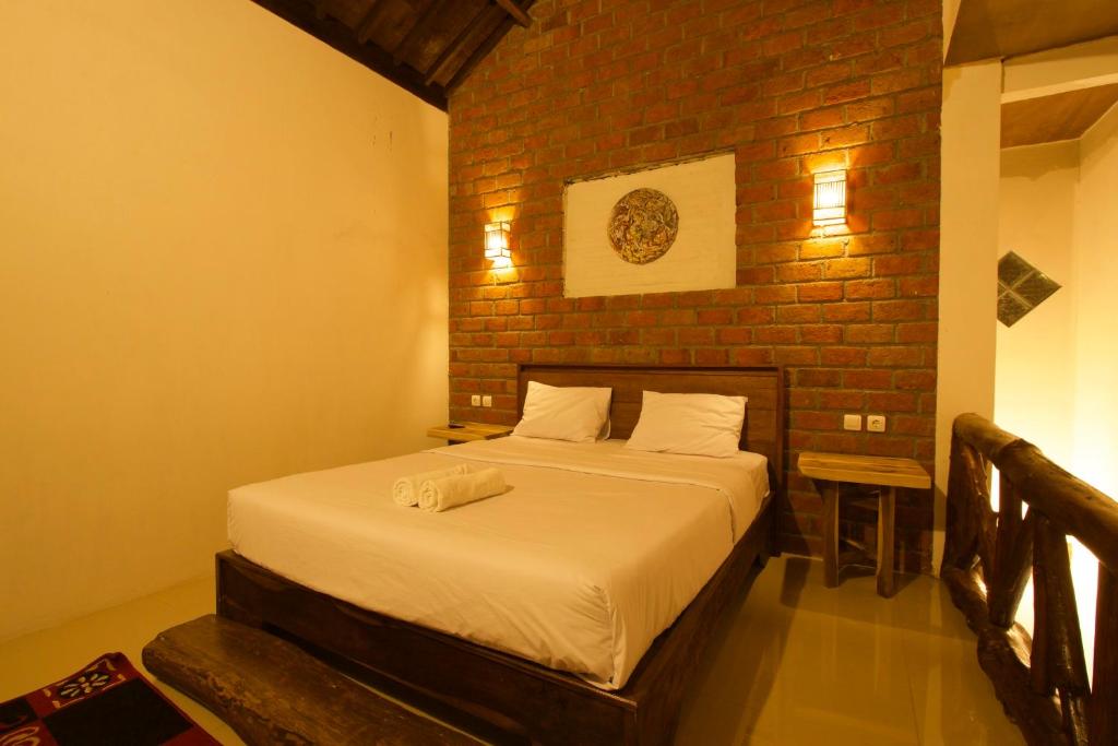 Postel nebo postele na pokoji v ubytování Mu Homestay