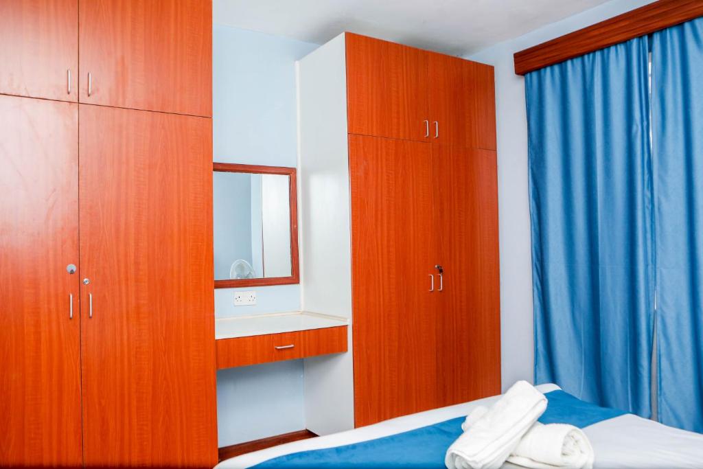 Postel nebo postele na pokoji v ubytování Tiamcy homes