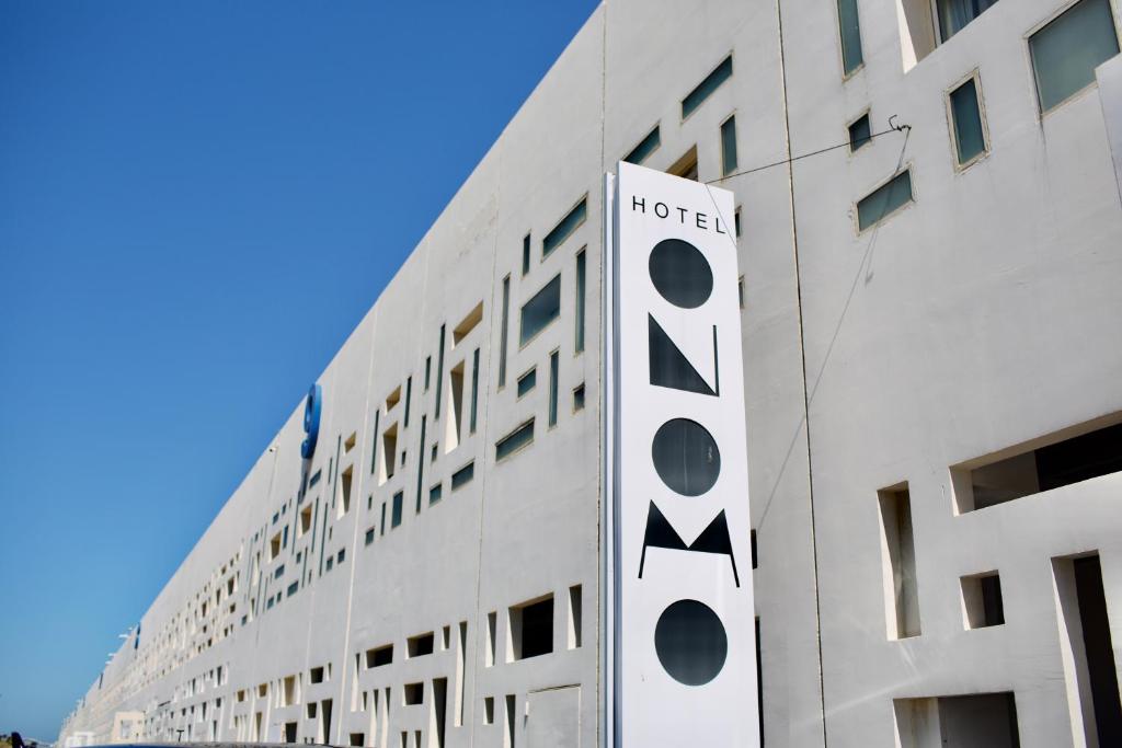 a hotel sign on the side of a building at ONOMO Hotel Tanger Med in Tangier