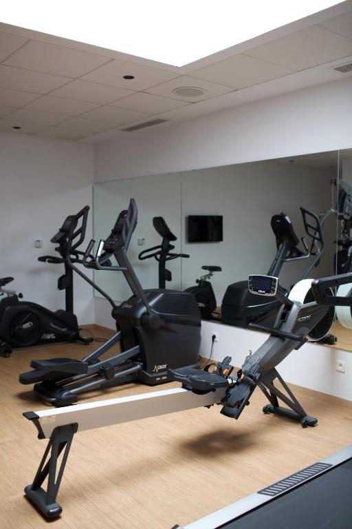 a gym with several exercise bikes in a room at ONOMO Hotel Tanger Med in Tangier