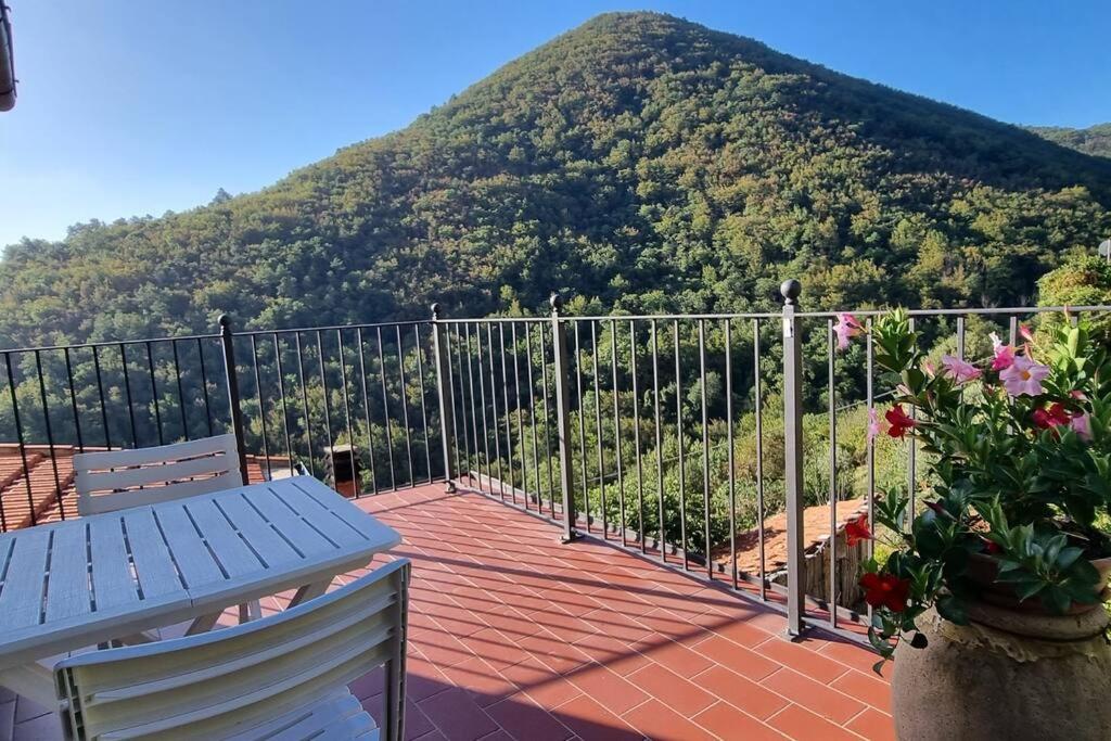 a balcony with a view of a mountain at DaFramanco2 Country house close to 5 Terre in Quaratica