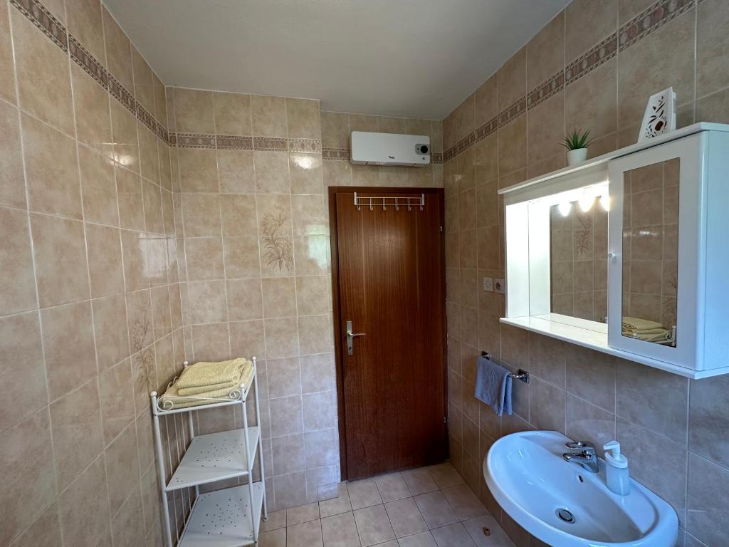 Koupelna v ubytování Apartments Matejčić