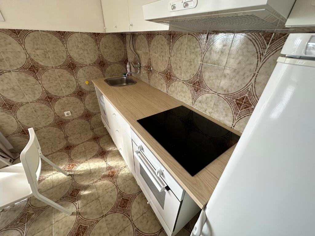 Kuchyň nebo kuchyňský kout v ubytování Apartments Matejčić