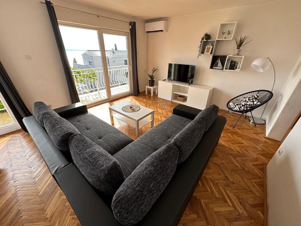 TV a/nebo společenská místnost v ubytování Apartments Matejčić